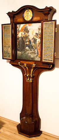 A German Art Nouveau gilt bronze and brass mounted rosewood commemorative tryptic Berlin, signed and dated 1901, the cabinet by Alfred Grenander (1863 – 1931), the painting by Arthur Kampf (1864 – 1950) and the metalwork by Otto Rohloff (1863 – 1919)