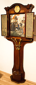 A German Art Nouveau gilt bronze and brass mounted rosewood commemorative tryptic Berlin, signed and dated 1901, the cabinet by Alfred Grenander (1863 – 1931), the painting by Arthur Kampf (1864 – 1950) and the metalwork by Otto Rohloff (1863 – 1919)